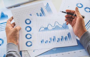 Poster - businessman working data document graph chart report marketing research development  planning management strategy analysis financial accounting. Business  office concept.