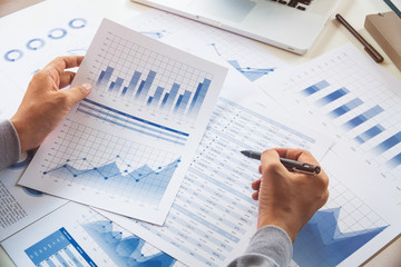 Fototapete - businessman working data document graph chart report marketing research development  planning management strategy analysis financial accounting. Business  office concept.