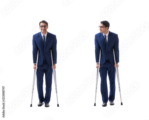 Fotomural Businessman walking with crutches isolated on white background