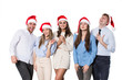 © BestForYou - Group of happy young people in santa hats on white background.