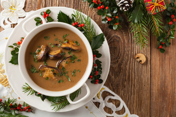 Traditional mushroom soup, made from porcini mushrooms. Christmas decoration.