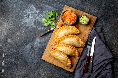 Cuadros en Lienzo Latin American fried empanadas with tomato and avocado sauces