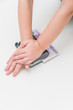 © dmitrypk - close - up, the hand presses the hole in which the bill is invested five hundred euros, money