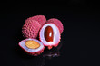 Litchi chinensis lychee sweet fruit on black background