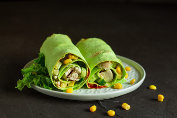 burrito wraps green with meat and vegetables  (tortilla wraps). top view. copy space