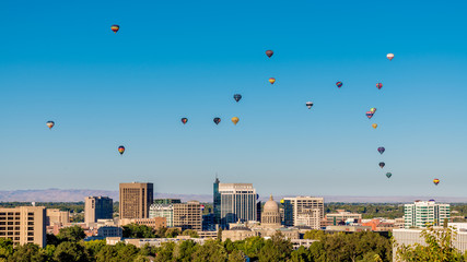 Wall Mural - Unique view of the Boise skyline in summer with many hot air balloons floating by