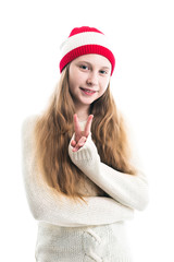 Happiness winter holidays christmas. Teenager concept - smiling young woman in red hat, scarf and over white background.