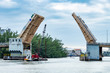 Sheridan Street double-leaf bascule bridge opens to allow a vessel through - Hollywood, Florida, USA