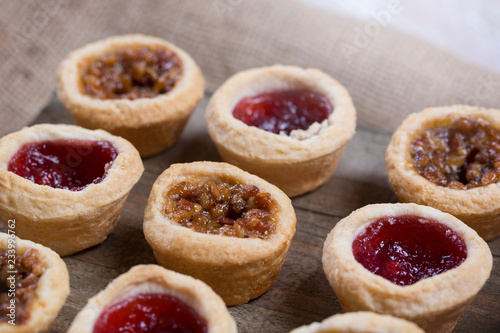 Fotografie, Obraz Miniature Pecan, Cranberry, and Apple Pies