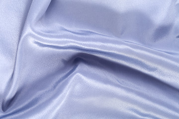 Silk background, texture of gray  blue  shiny fabric