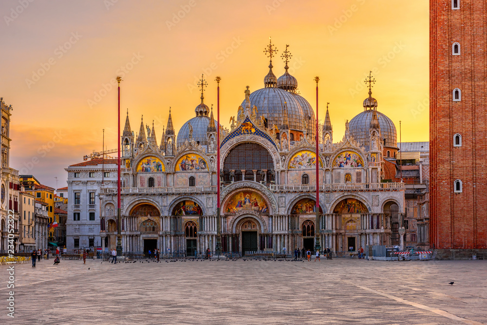 View of Basilica di San Marco and on piazza San Marco in Venice, Italy. Architecture and landmark of Venice. Sunrise cityscape of Venice. - obrazy, fototapety, plakaty 