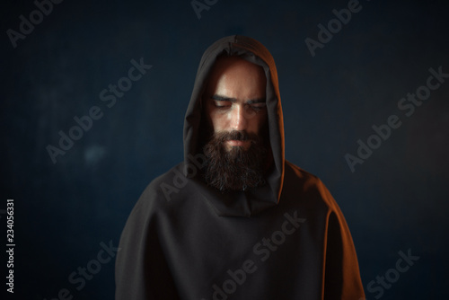 Cuadros en Lienzo Portrait of medieval monk in black robe with hood