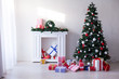© dmitriisimakov - Christmas background Interior new year tree gifts winter postcard