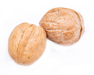 Brown raw organic walnut isolated on white background