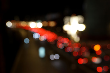 Wall Mural - View of the night street lights of car headlights.