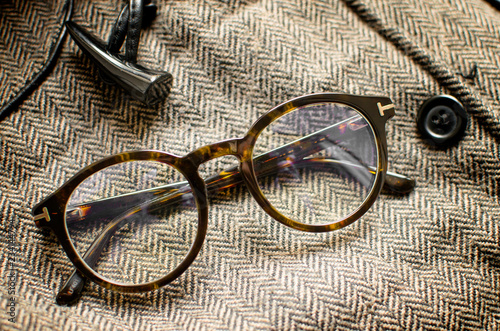 Fotografija Vintage eyeglasses on tweed background