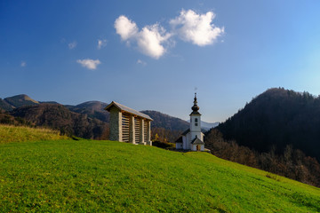 Wall Mural - Spodnje Danje village church with hayrack