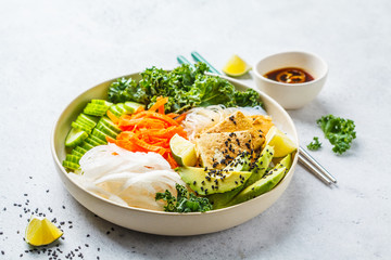 Wall Mural - Vietnamese rice noodle with grilled tofu and  chilli vegetables salad in white bowl, copy space.