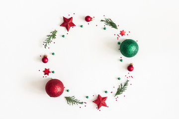 christmas composition. christmas wreath made of decorations, fir tree branches on white background. 