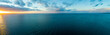 canvas print picture - Wide aerial panorama of sunset over ocean - minimalistic seascape