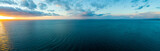 Fototapeta Na ścianę - Wide aerial panorama of sunset over ocean - minimalistic seascape