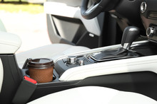 Takeaway Paper Coffee Cup In Holder Inside Car