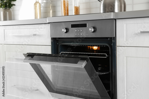 Fotografía Open modern oven built in kitchen furniture