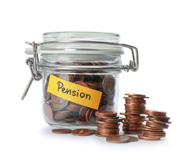 Coins in glass jar with label 