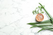 Flat lay composition with aloe vera leaves on marble background. Space for text