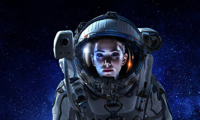 Wall Mural - Attractive woman in spacesuit