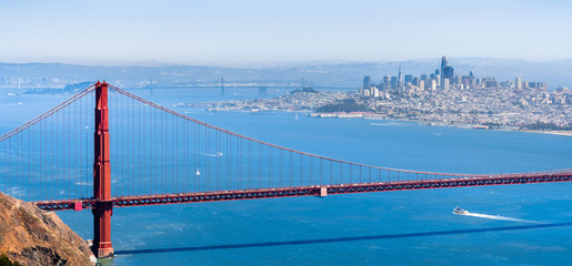 Wall Mural - Aerial view of Golden Gate Bridge; the San Francisco skyline visible in the background; California