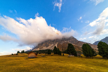 Wall Mural - Wooden rural farmer's shed (hut) in a mountains.