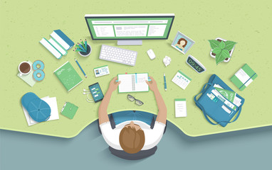 Man sitting at the table and takes notes. Workplace Desktop Workspace Armchair, office supplies, monitor, books, notebook, headphones, phone, glasses, pen, bag, coffee, donut, cap. Vector Top view 