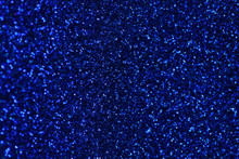 Dark Blue Sparkling Background From Small Sequins, Closeup. Brilliant Backdrop