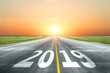 © aapsky - View of the peaceful open road against the setting sun forward to new 2019 year. Concept of success in the future.