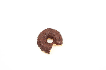 Wall Mural - Bitten chocolate donut with sprinkles isolated on white background. Top view