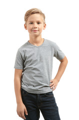 Wall Mural - Cute boy in t-shirt on white background