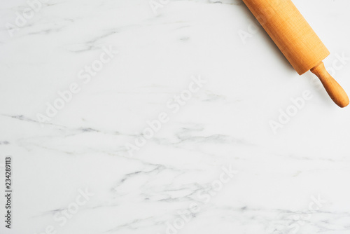Simple Baking Background With Rolling Pin On White Marble Table With Rolling Pin On White Marble Table