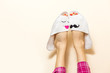 Love can be expressed in funny way. Woman legs in funny slippers