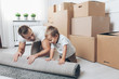 © and.one - Moving concept, Father and son moving to a new home