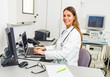 © BGStock72 - Young doctor with stethoscope in her doctor's office.