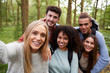 © Monkey Business - Multi ethnic group of five young adult friends taking a selfie in a forest during a hike, portrait