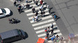 Paris, France - circa May, 2017: Aerial view of pedestrian crossing on street in Paris next to Eiffel Tower