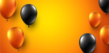 Festive Background With Black And Orange Shiny Balloons.