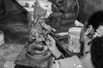 Wall Mural - Clay model of Lord Ganesh\Ganesha being molded by local artist in the town of Bicholim, Goa