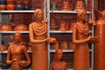 Wall Mural - A variety of local handmade Clay pottery and home decor sold in Goa India 