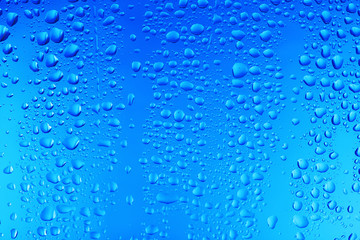  View of glass with water drops, closeup