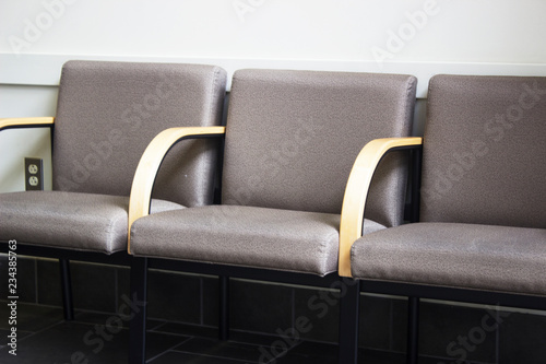 Fotografie, Obraz Close up of row of empty chairs in office waiting room