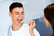 © Sergey Nivens - Couple cooking and tasting food