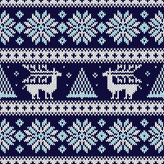 Wall Mural - Seamless knitting pattern with snowflakes, deer, fir and other winter elements. Blue Christmas sweater design in the scandinavian style. Vector knitted texture